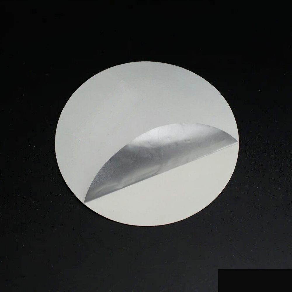 Aluminium foil induction seal liner with PET backing